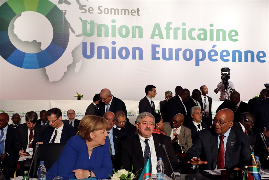 German Chancellor Angela Merkel speaks with President Jacob Zuma at the African Union European Union Summit in Abidjan, Ivory Coast. Picture: Ludovic Marin/Reuters