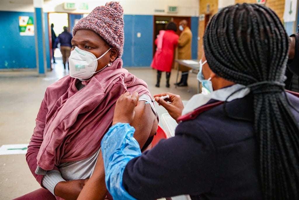 Teachers at the Rabasotho Community Hallo vaccination site on 23 June 2021 in Tembisa, South Africa. 
