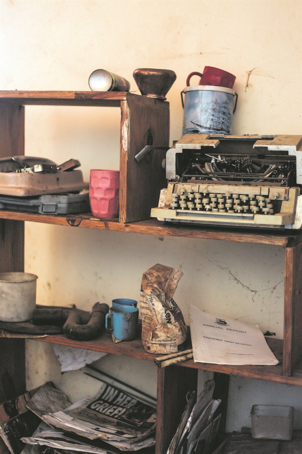 A storeroom in Norah Nomafa Moahloli’s home, where she has kept some of the objects Madikizela-Mandela used during her time in Brandfort, Free State. Hugh Masekela’s father, Selema, built the bookshelf for her. She used the typewriter to write letters to her then husband Nelson Mandela Picture: Mpumelelo Buthelezi