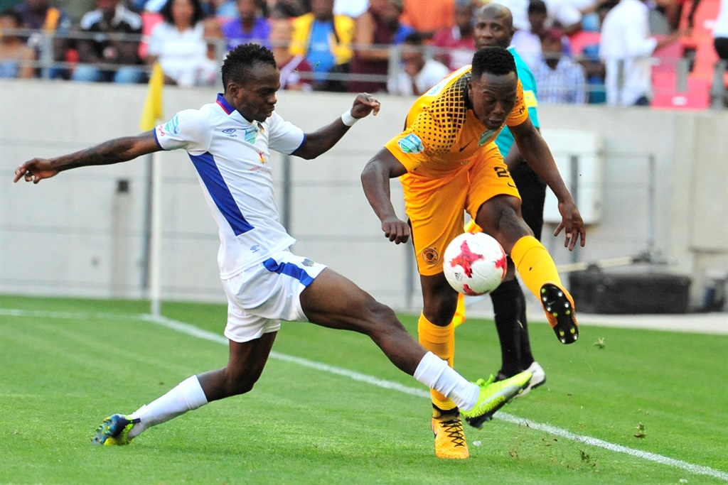 Abel Mabaso of Chippa United tackling Philani Zulu