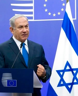 Israeli Prime Minister Benjamin Netanyahu addresses a media conference with European Union High Representative Federica Mogherini at the EU Council building in Brussels. (Virginia Mayo, AP)