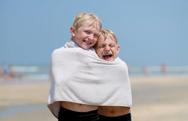 boys sharing towel 