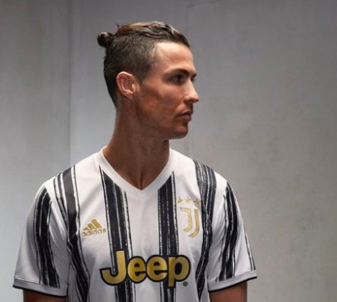 Cristiano Ronaldo unveils Juventus' 'bold orange' third kit for