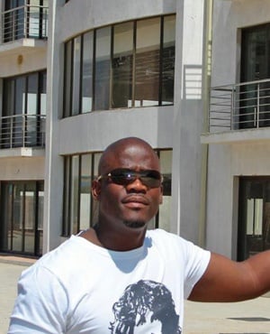 North West businessman Wandile Bozwana in front of some of his buildings. Picture: Dumisane Lubisi