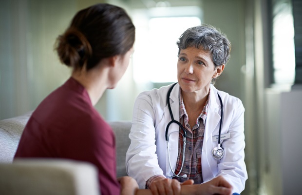 Woman talking to her female doctor 