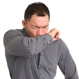 Coughing into the crook of your arm helps to prevent the spread of germs.