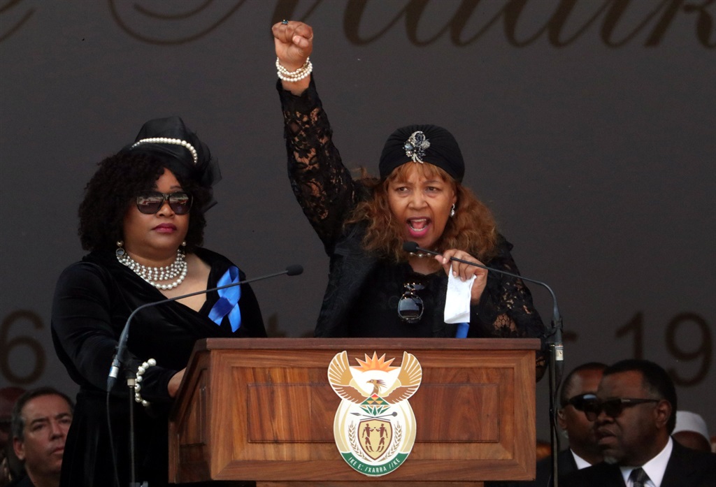 Daughters of Winnie Madikizela-Mandela, Zindzi Mandela and Zenani Dlamini Mandela, speak at their mother's funeral in Orlando stadium in Soweto. PHOTO: REUTERS/Mike Hutchings