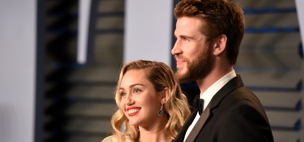 Miley Cyrus and Liam Hemsworth. (PHOTO: Getty Images)
