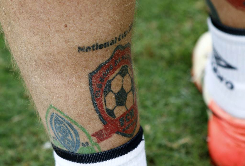Man United fan who detests Liverpool gets rival teams crest TATTOOED  onto his calf for touching reason  Mirror Online