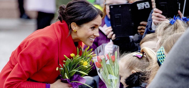 Meghan interacts with the crowd in Birkenhead. (Photo: AP)
