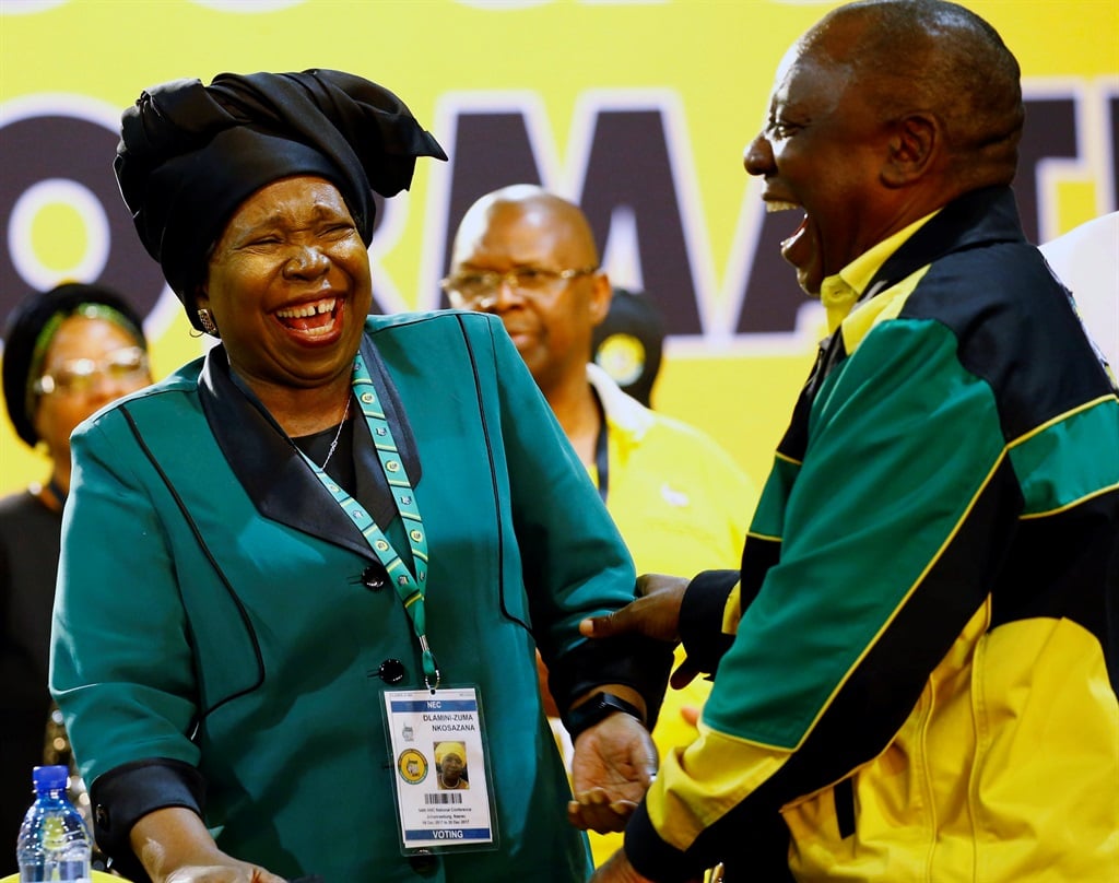 Presidential hopefuls, Nkosazana Dlamini-Zuma and Cyril Ramaphosa, share a light moment during the 54th African National Congress national conference held at the Nasrec Convention Centre, Johannesburg. Picture: Kim Ludbrook/EPA