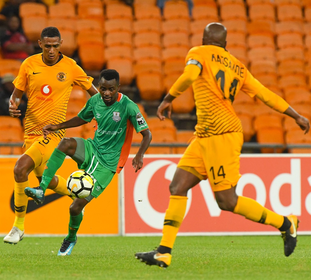 John Ching Andu of Zesco with possession against Mario Booysen and Willard Katsande of Kaizer Chiefs during the CAF Confederation Cup match. Picture: Sydney Seshibedi/Gallo Images