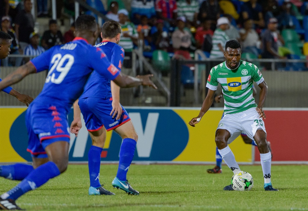 Lucky Baloyi of Bloemfontein Celtic challenged by Morgan Gould and Dean Furman of SuperSport United