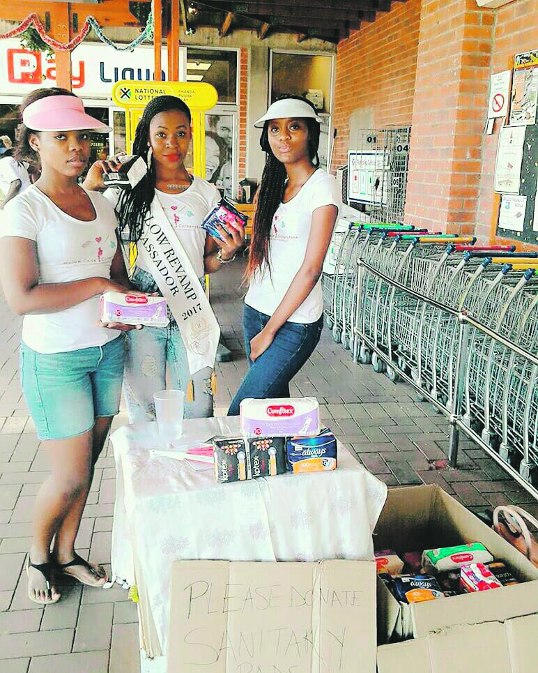 Mellow Revamp models Tsholo Mathebula, Malebo Molimi and Claude Mashego collect sanitary towels to donate to needy pupils.