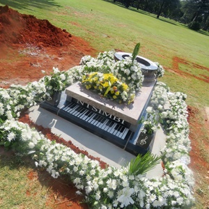 The tombstone of the late Musician Robbie Malinga is set ...