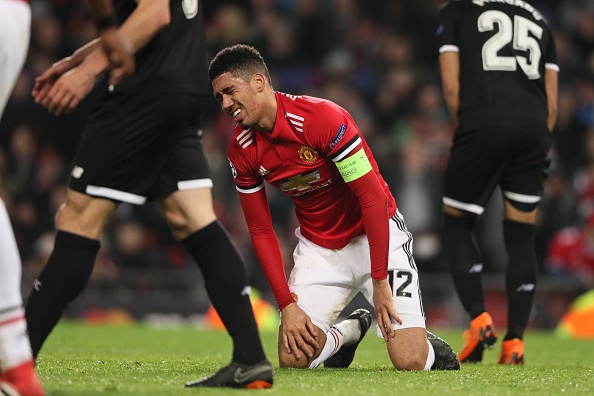 A dejected Chris Smalling of Manchester United after reacting to his header going wide during the UEFA Champions League Round of 16 Second Leg 