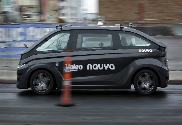 <b> WHERE'S THE DRIVER? </b> A Navya Autonom Cab, a self-driving vehicle, drives down a street during a demonstration at CES International in Las Vegas. <i> Image: AP / John Locher </i>