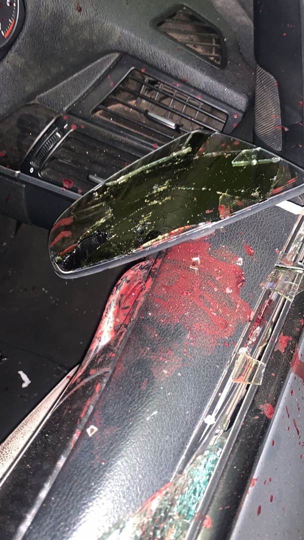 The window and mirror on Katsande's car was damage