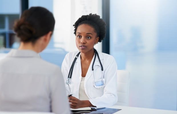 woman visiting her doctor