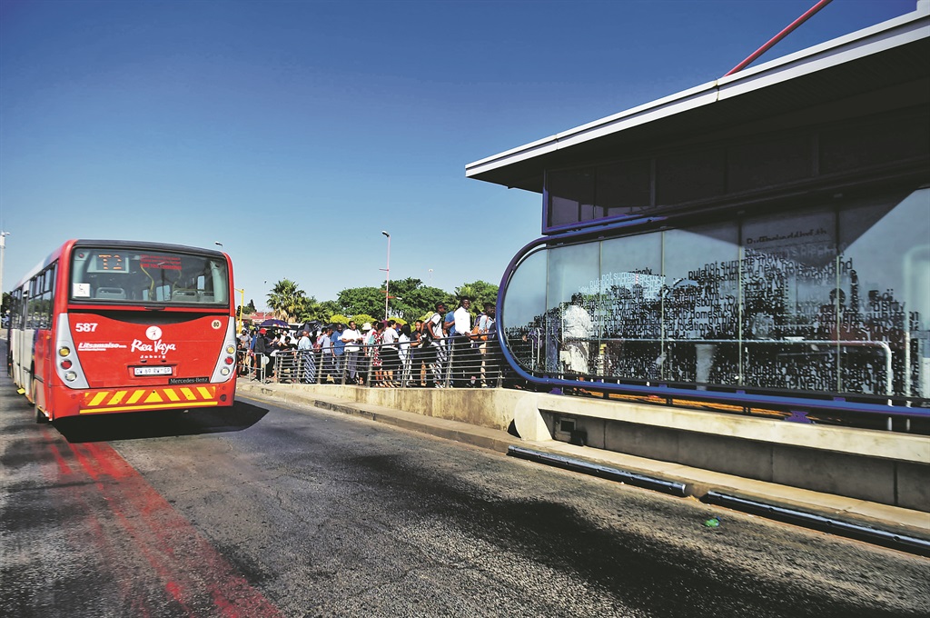 Long queues of commuters at Rea Vaya bus station as a result of national taxi strike.Photo by Lucky MorajanePhoto by 