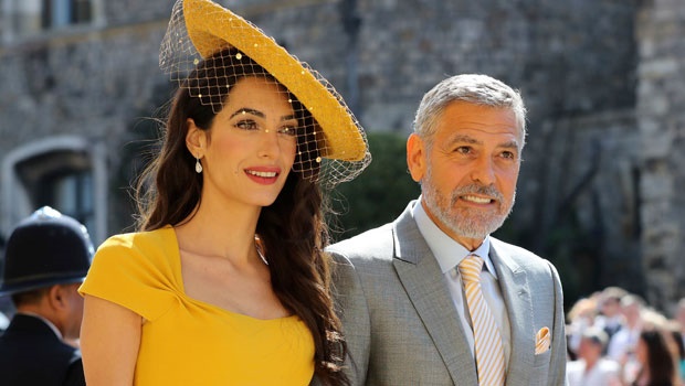 Amal Clooney and her husband, George, arrive at the Royal Wedding