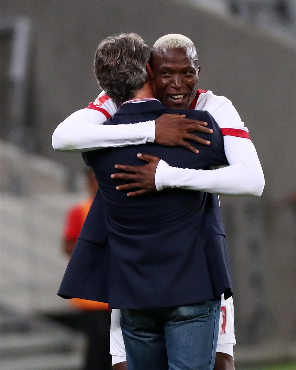 Tendai Ndoro, seen here hugging his coach Muhsin Ertugral, has added value and quality to the Ajax Cape Town attack. 