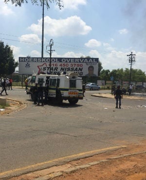 A police nyala is seen outside Hoërskool Overvaal school during the protest action on Thursday. (Iavan Pijoos, News24) 
