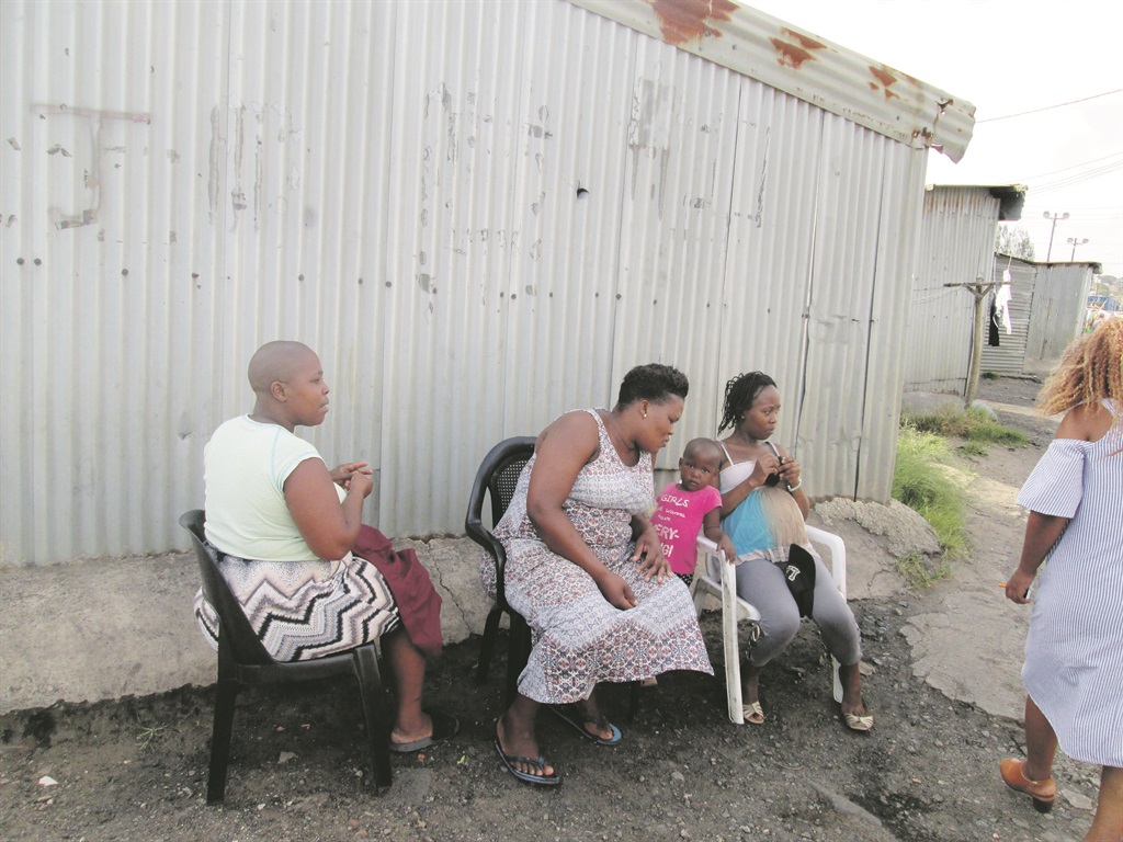 These people say they have lived in a transit camp since 2007 and still don’t know when they will be given houses.                            Photo by Willem Phungula
