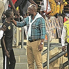 SUPPORT:   Kaizer Chiefs coach Steve Komphela comforts a ball boy after he was sent off for time-wasting. (Lefty Shivambu, Gallo Images)