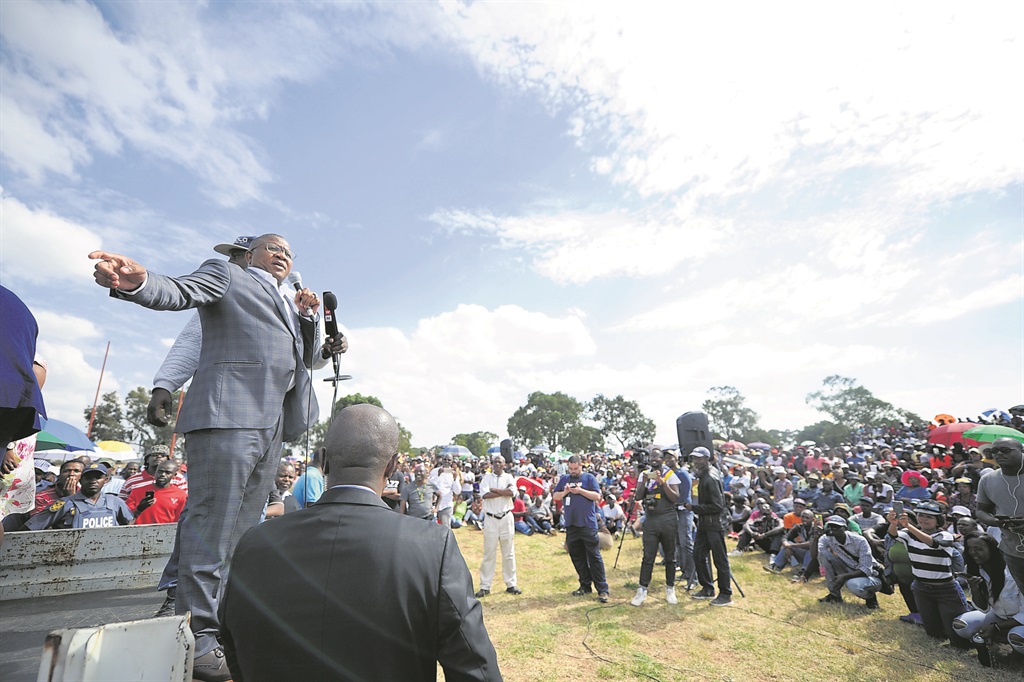 Police Minister Fikile Mbalula addressed residents in Kagiso after they took to the streets to protest against the bad service they received from the police.                                          Photo by Christopher Moagi