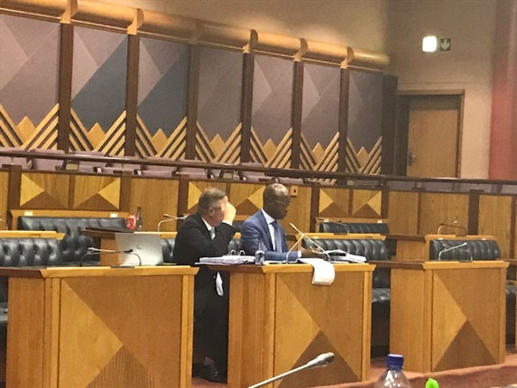 <p><strong>Treasury did not support extension of Optimum Mine contract</strong></p><p>National Treasury did not agree with the extension of a coal
supply contract from Tegeta’s Optimum Coal Mine, the Eskom Inquiry heard on
Wednesday.
</p><p>Inquiry chair Advocate Ntuthuzelo Vanara read out a letter
Eskom received from Treasury regarding the contract. </p><p>Eskom had sent Treasury a
written request in August 2016, while Brian Molefe was still group chief executive.
The entity requested to extend the contract from Optimum, owned by Tegeta, to provide
Eskom’s Arnot Power Station with coal.
</p><p>Treasury noted the “varied” reasons Eskom provided for the
extension, but it is not clear why the competitive bidding process was not
finalised for Eskom to comply with certain requirements of the Constitution.</p><p>“National Treasury does not support the extension of the existing
contact, but it supports the deviation to request four potential suppliers to
submit proposals for volumes of supply,” Vanara read from the letter.
</p><p>Treasury requested that Eskom submit an assessment from the
four suppliers, which included Exxaro and Tegeta (Optimum). </p><p>Essentially a
closed bid process was undertaken. 

Koko said that the letter sounded “familiar” to him. Eskom
undertook the closed bid process and submitted the report to Treasury in March
2017. It recommended two service providers, Exxaro and Optimum.</p><p>The closed bid process however was finalised in July 2017. Koko
could not answer to this as he was not at Eskom at the time, he was placed on
special leave in May 2017, he said.<strong></strong></p>