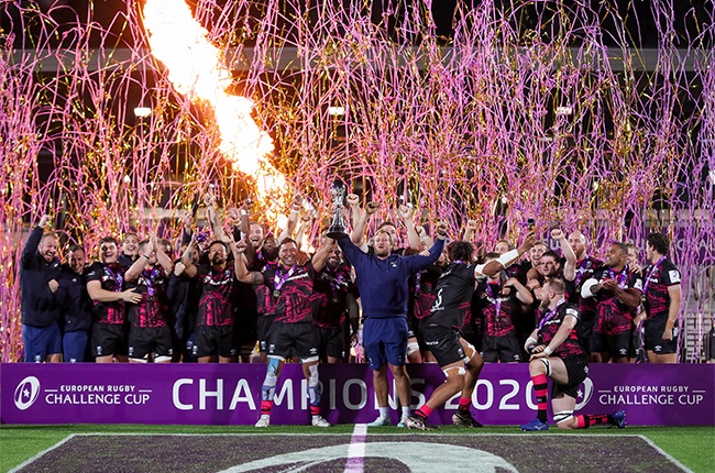 Siale Piutau of Bristol Bears and Jordan Crane of Bristol Bears lift the trophy as the Bristol Bears players celebrate victory during the European Rugby Challenge Cup Final between Bristol Bears and RC Toulon at Stade Maurice-David on October 16, 2020 in Aix-en-Provence, France.