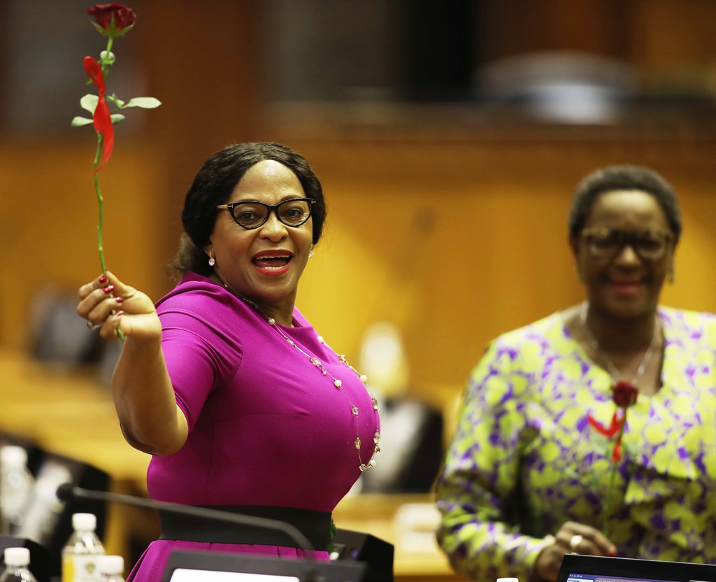 Environmental Affairs minister Nomvula Mokonyane shares a Valentine's moment during President Cyril Ramaphosa's State of the Nation Address (SONA) 2019 debate reply at the National Assembly on February 14, 2019. (Photo by Gallo Images / Sowetan / Esa Alexander)
