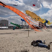 Four badly hurt after car hits crowd at French kite festival