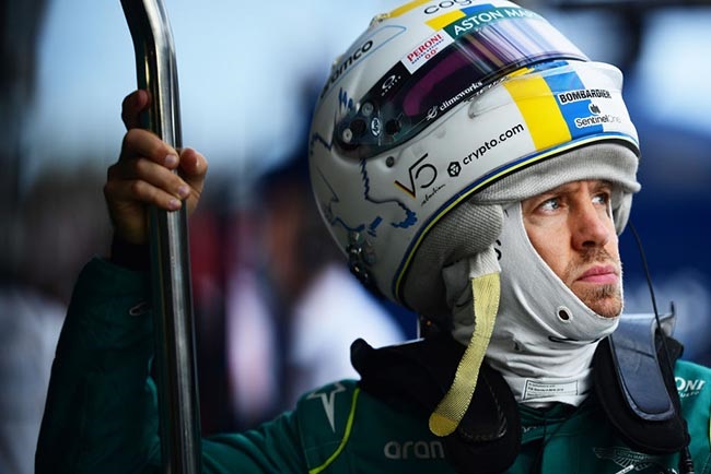 Sebastian Vettel of Germany and Aston Martin F1 Team looks on in the garage during qualifying ahead of the F1 Grand Prix of Australia at Melbourne Grand Prix Circuit on April 09, 2022 in Melbourne, Australia. 