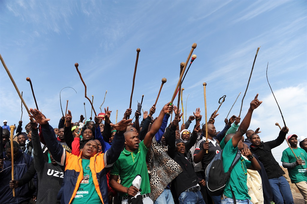 Miners singing at the koppie in Marikana during the commemoration of the fateful day six years ago.PHOTO: Felix Dlangamandla