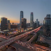 Beijing, Shanghai residents back to work as China eases into living with Covid-19