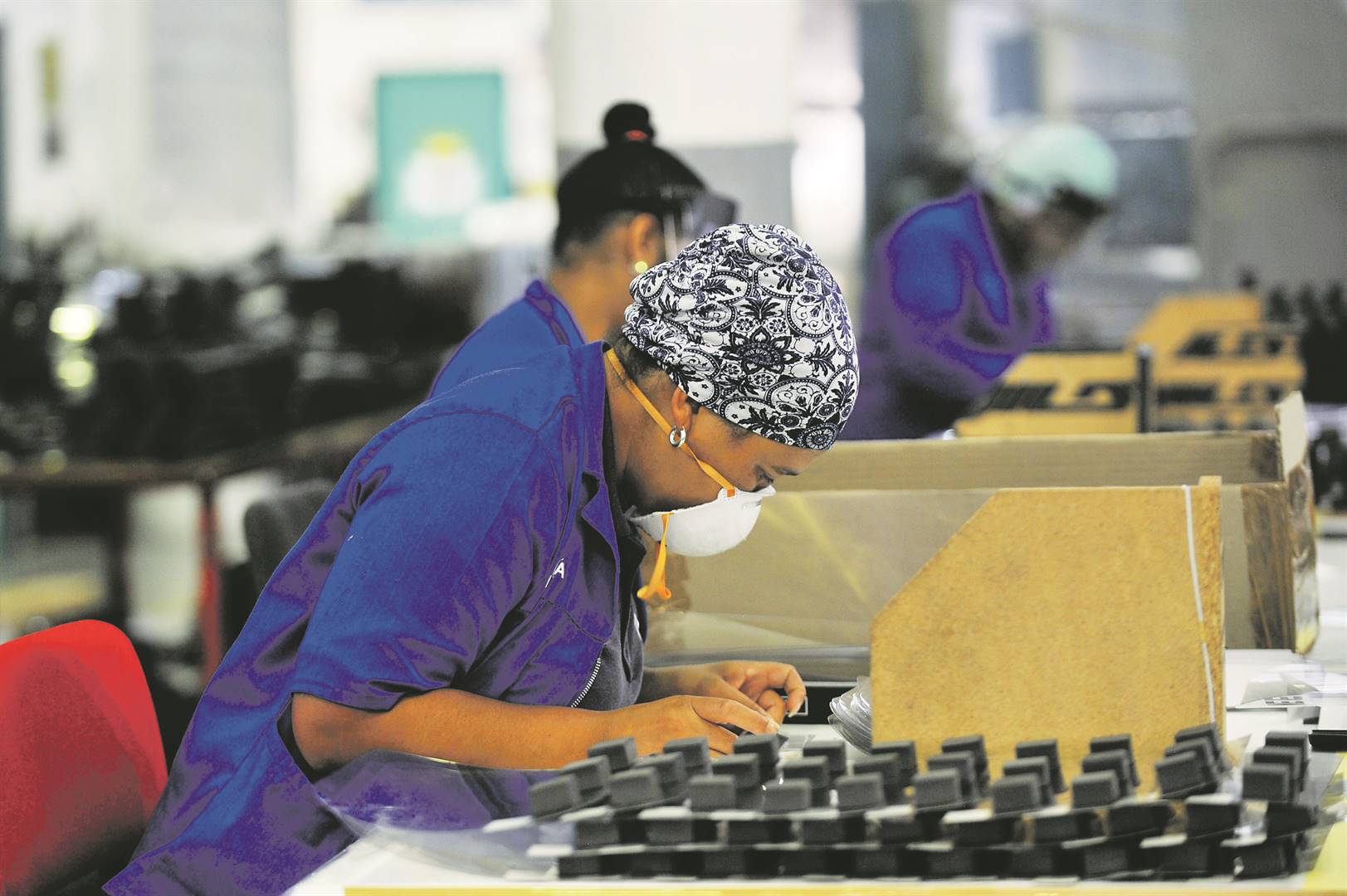 Cape Town-based Creative Graphics International has gone from making car badges to making 350 000 face shields a week during the lockdown. Picture: Supplied/ Gallo Images