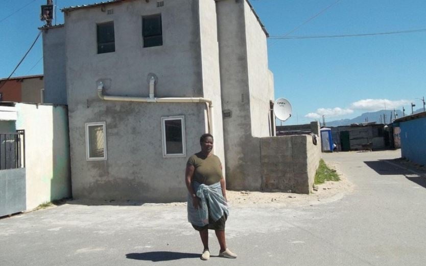 Bukelwa Wanyaza saved for years from her salary as a petrol attendant to build four small rental flats in Delft. While business once boomed, she has been losing tenants due to frequent electricity blackouts. (Photo: Vincent Lali)