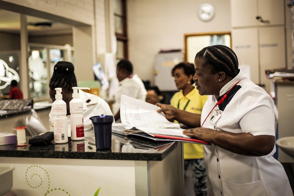 An auxiliary nurse who is busy with one of the patients files at Chris Hani Baragwanath Hospital, Soweto. Picture: Mpumelelo Buthelezi/ City Press/File