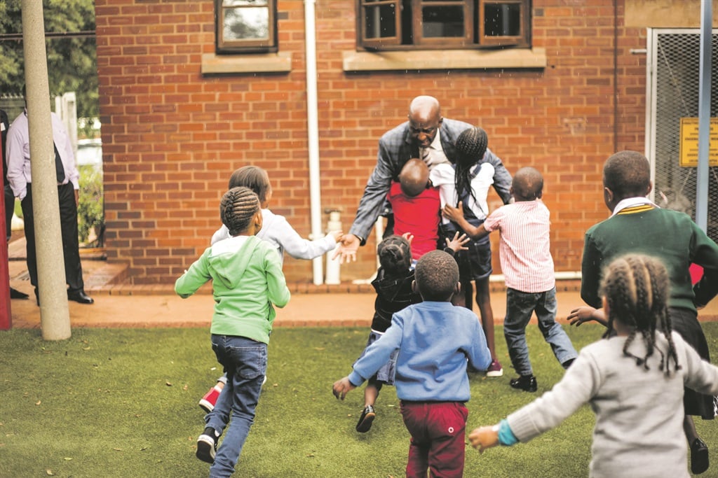 Siphiwe Msimango plays with the children during visiting hours at Baragwanath Hospital, Soweto. Picture: Mpumelelo Buthelezi