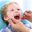 When should my child first see a dentist? 