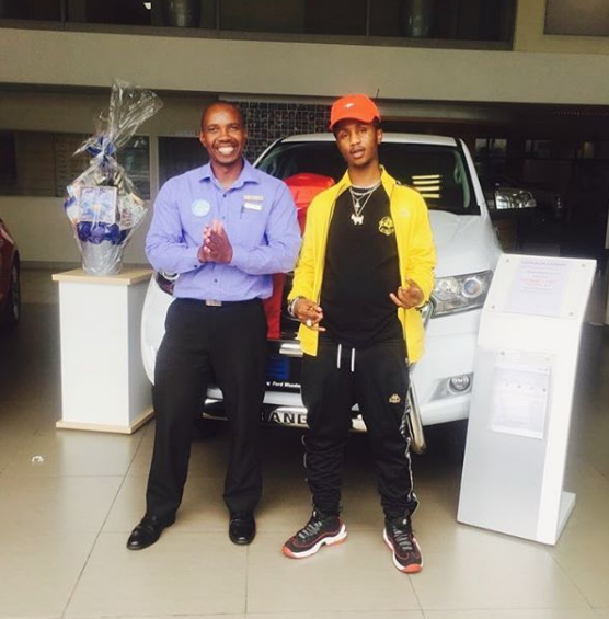 Emtee and his Dad next to the new car he just bought for him. Photo: Instagram