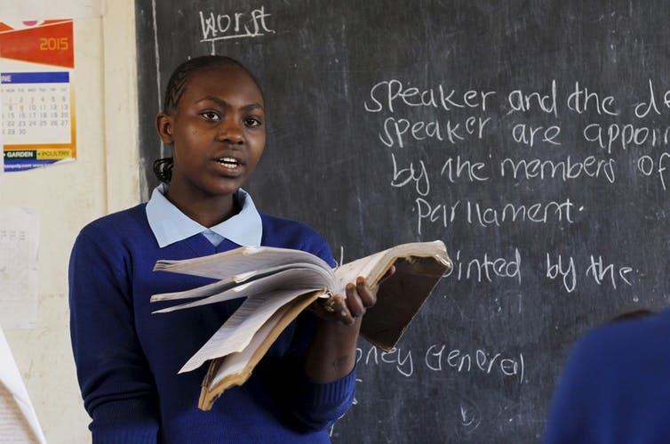 Education empowers young people like Sarah Nasira, a Kenyan pupil leading a class. (Thomas Mukoya)