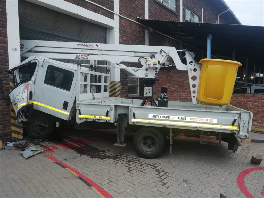 Some of the vehicles that were damaged when a municipal worker started behaving violently.