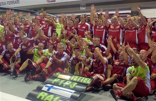 Team Ferrari was so ecstatic about Sebastian Vettel's Singapore victory that its post-race celebrations got out of hand.