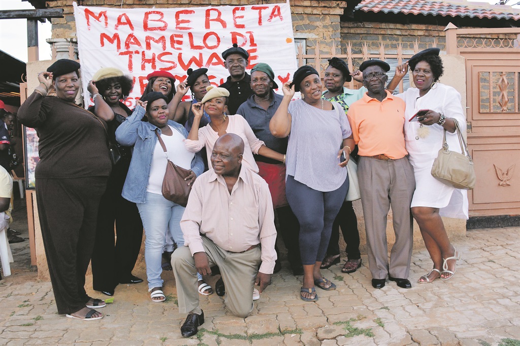 Mabereta members talk serious business.         Photo by  Morapedi Mashashe