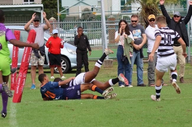 Grey College's Alzeadon Felix is unable to stop Selborne's Siya Sakhela from scoring when the sides met on Saturday. (Selborne College's Facebook page)