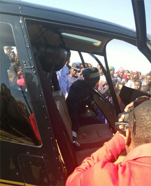 Vusi takes a look inside the helicopter.<br />