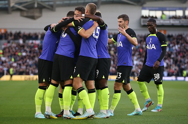 Harry Kane of Tottenham Hotspur celebrates with teammates after scoring against Brighton & Hove Albion. (Photo by Steve Bardens/Getty Images)